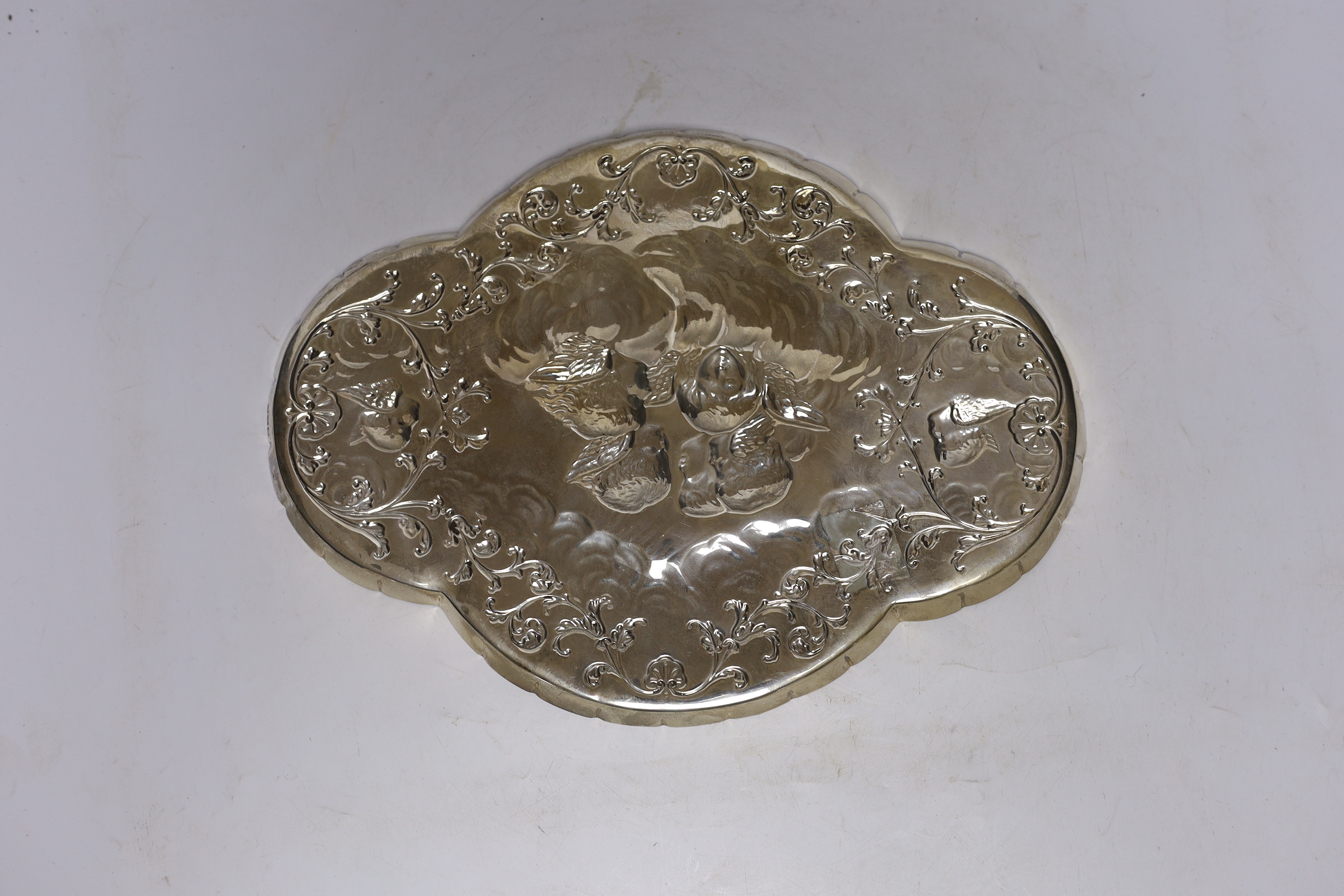 A late Victorian silver 'Reynold's Angels' dressing table tray, by William Comyns, London, 1897, 30.9cm